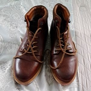 Leather high top ankle boots.